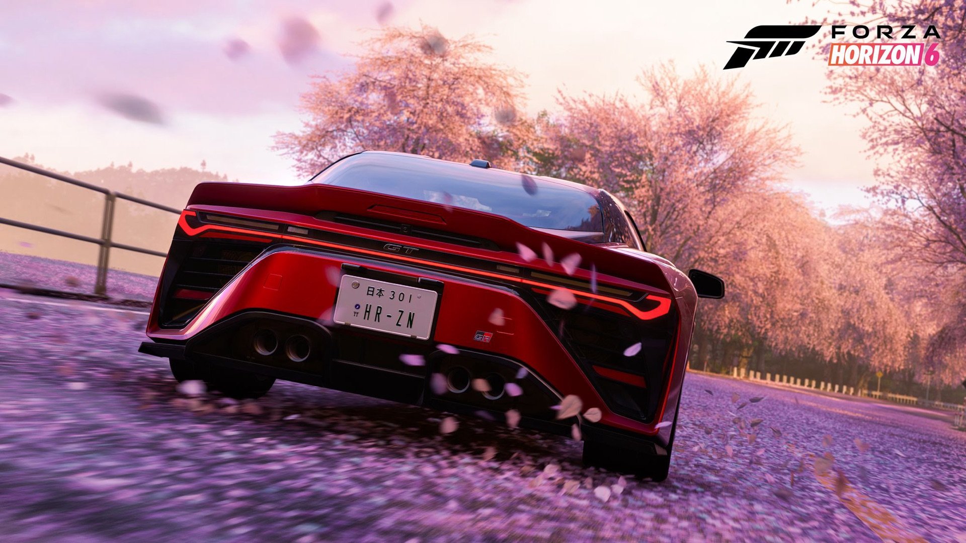 Forza Horizon 6'da kiraz çiçekleriyle kaplı yolda kırmızı spor otomobil