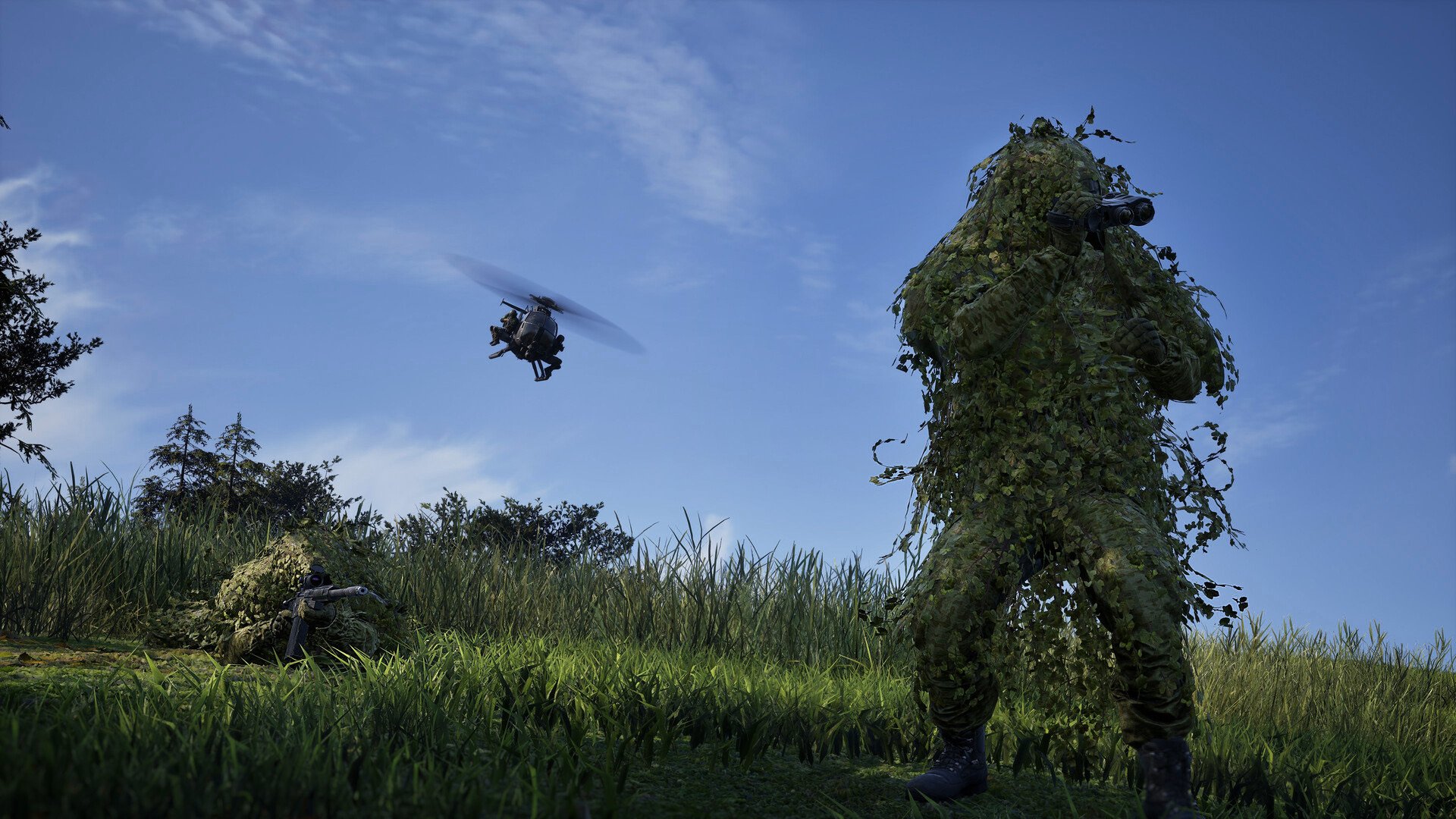 Wardogs'ta kamuflaj giysili keskin nişancı ve arkada helikopter
